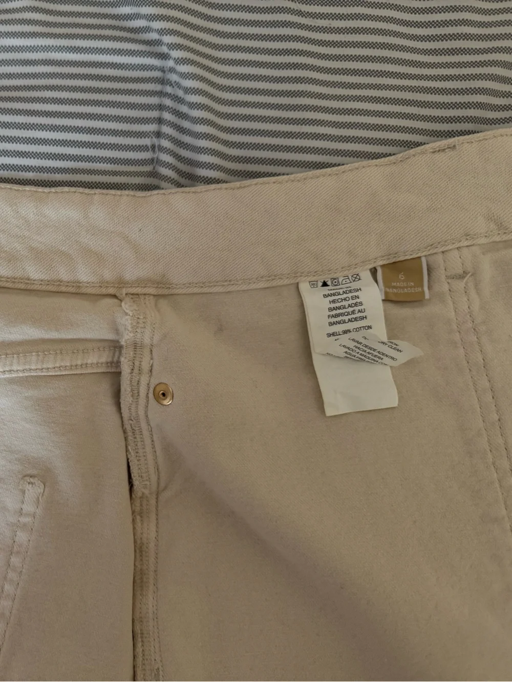 Michael Kors: Button-Front Cream Mini Skirt